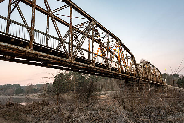 istock iron structure bridge over the river Gauja, popular walking spot, dawn light 2236679884