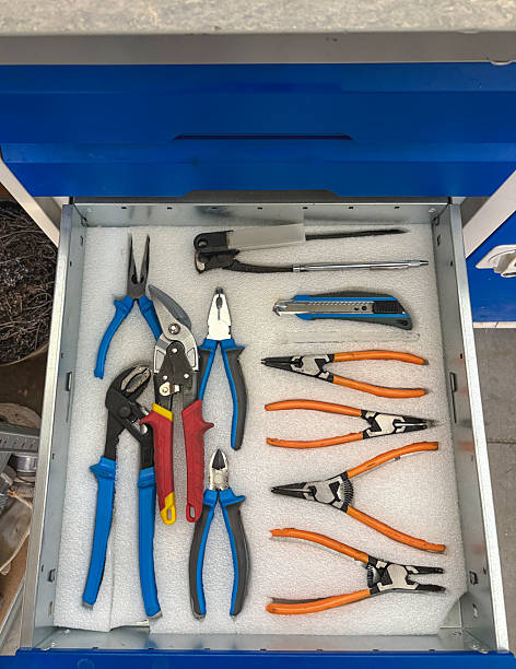 A neatly organized set of various hand tools