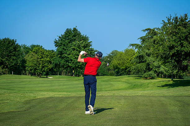 istock Golfer performing swing on a sunny day at the golf course 2236684823
