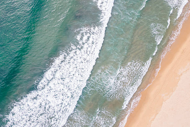 istock Turquoise ocean waves and beach aerial view, natural background. 2236685300
