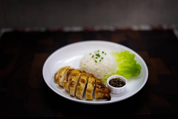 istock Grilled Chicken With Jaew Sauce And Plain Rice On White Plate 2236687138