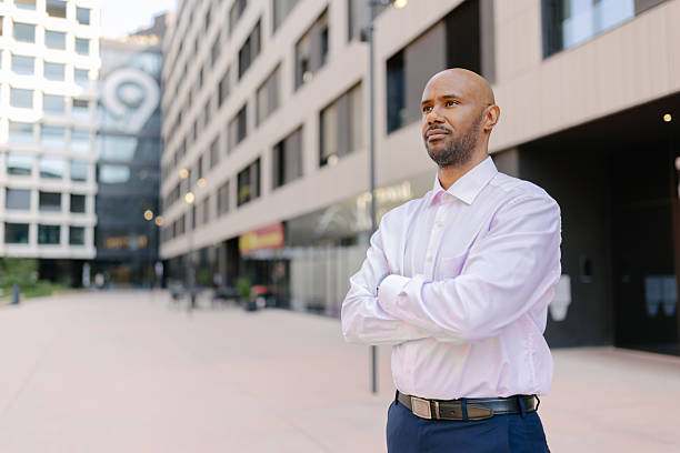 istock Confident man with crossed arms in urban area 2236694565