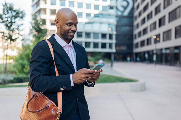 istock Business Man Texting While Enjoying Outdoors 2236695043