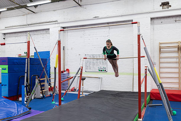istock Practicing Bar Skills at the Gymnastics Club 2236695270