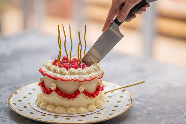 istock Holiday celebration cake in warm festive lighting 2236697048