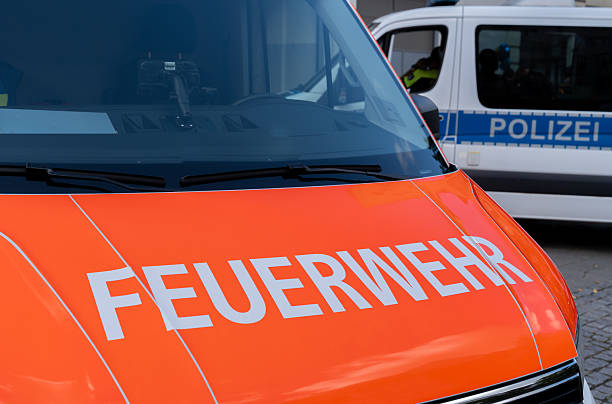 istock Front view of a fire engine in front of a police vehicle 2236697518