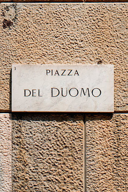 istock marble sign marks Piazza del Duomo in Milan 2236699762