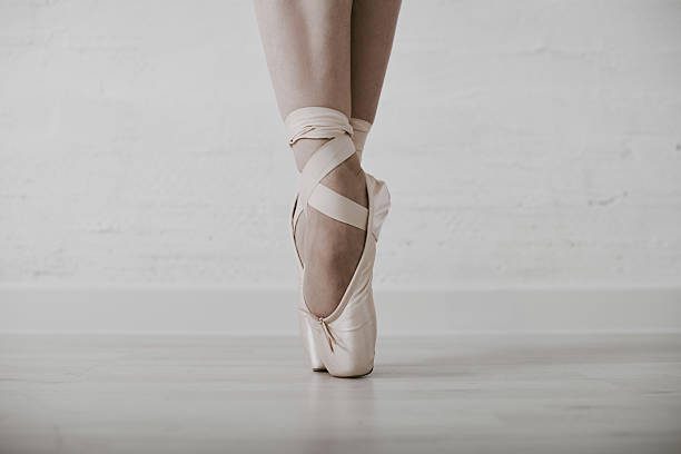 istock Ballerina on point in minimalist studio 2236699961