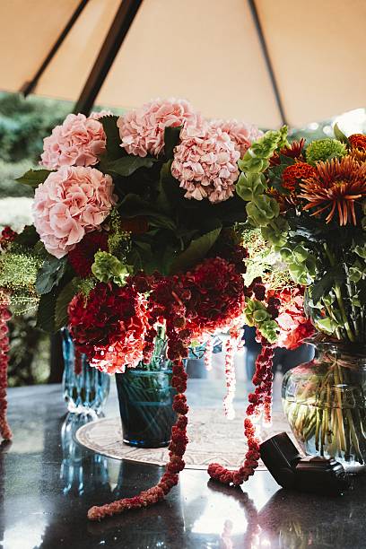istock Elegant Floral Arrangement on Display Table 2236702574