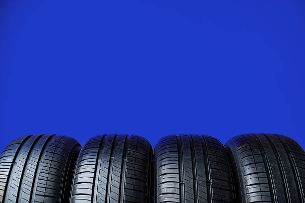 istock Group of tires on a blue background 2236710511