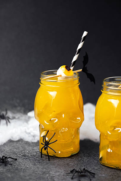 istock Halloween skull drink with eyeball and spider decoration, spooky fun for parties. 2236710810