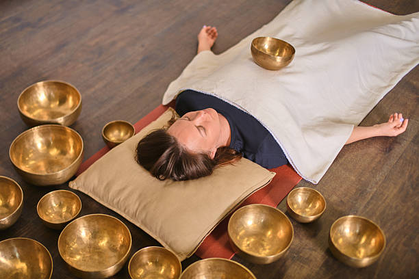 istock Relaxation with singing bowls in calming environment 2236714499