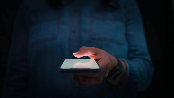 istock Close Up Of Woman Using Mobile Phone Text Messaging Using Thumb On Keypad 2236715018
