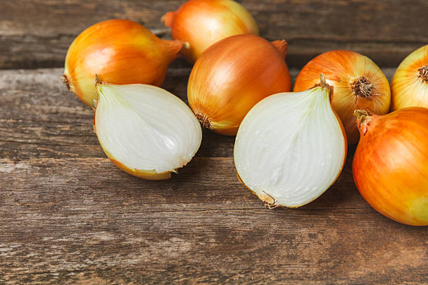 istock Onion on the kitchen table. onion slice. onion rings. Fresh Yellow Onion. Natural, fresh, vegetarian food. Agricultural products. Healthy eating. Vegetables. Farmer's market. Space for text.Copy space 2236722183