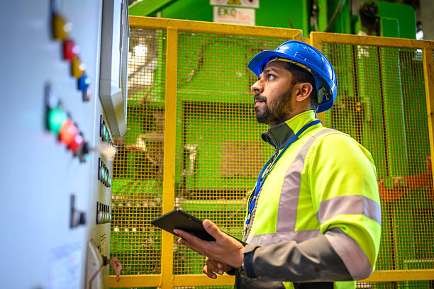 istock Focused Mid Adult Indian Male Worker Using Tablet in Recycling Facility 2236722586