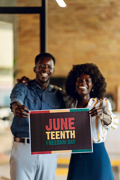istock Celebrating Juneteenth Freedom Day With a Joyful Gesture and Bright Smiles 2236724314