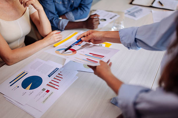 istock Team Analyzing Data and Charts During a Business Meeting at the Office 2236724386