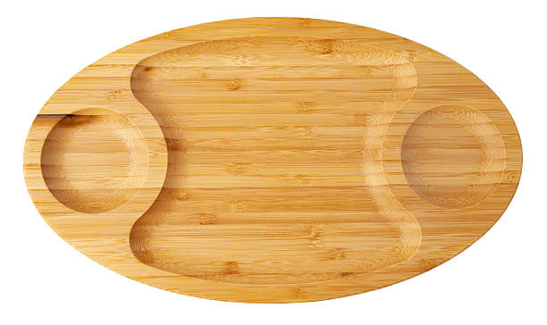 istock Wooden plate isolated on white background, close up 2236724440