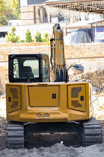 istock Heavy Excavator Working on a New Home Construction Site 2236726942