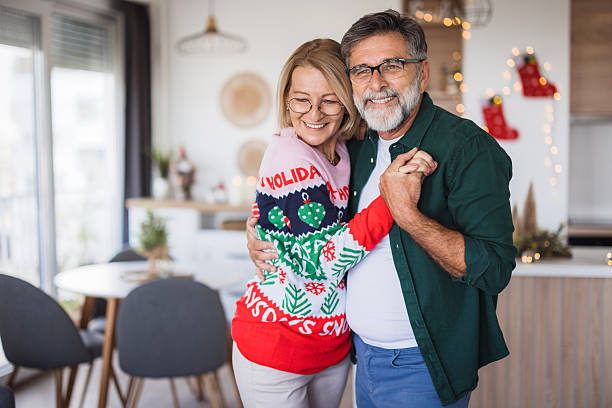 istock Senior couple dancing and embracing during christmas holidays 2236726993