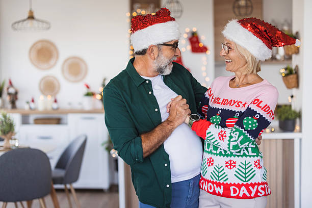 istock Senior couple dancing enjoying christmas holiday celebration 2236727049