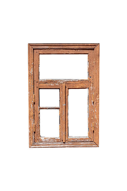 istock Old worn brown wooden window frame with four sashes is isolated. 2236728408