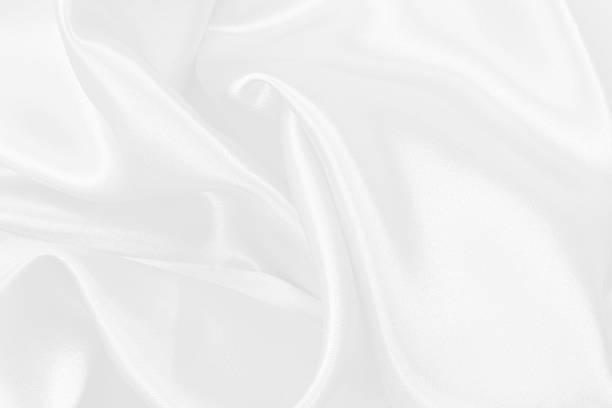 istock White fabric texture background, detail of silk or linen pattern. 2236730773