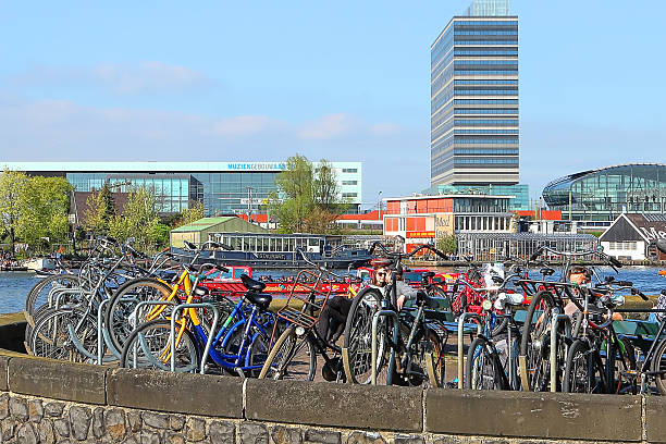 Amsterdam, Netherlands - April 8, 2017: Bicycle street parking. Amsterdam is the bicycle capital of Europe and one of the most original and unique cities of Europe
