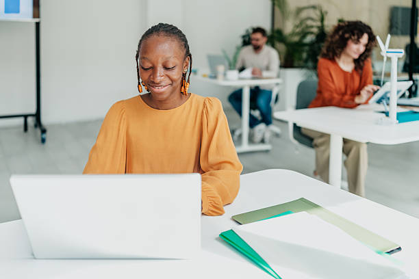 istock Young entrepreneur working happily at a modern startup office with colleagues engaged in discussions 2236737561