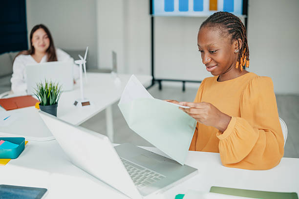 istock Young professionals collaborate at a startup office, sharing ideas and enjoying their work experience together 2236739076