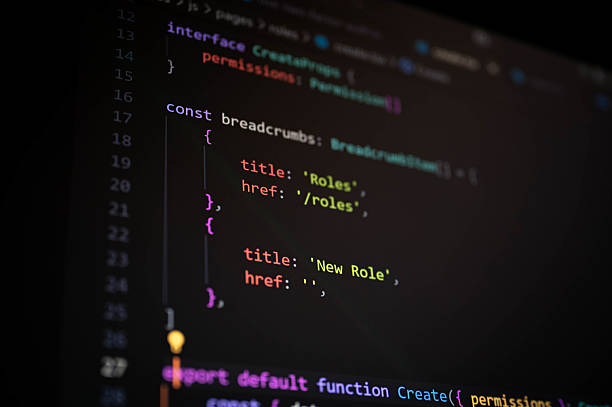 istock Close-up of TypeScript code displaying breadcrumb items structure with page titles and routes, representing frontend development, UI navigation, and clean code practices for modern web applications. 2236739344