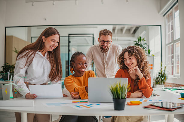 istock Young professionals collaborate in a cheerful startup office for innovative business ideas and team growth 2236739409