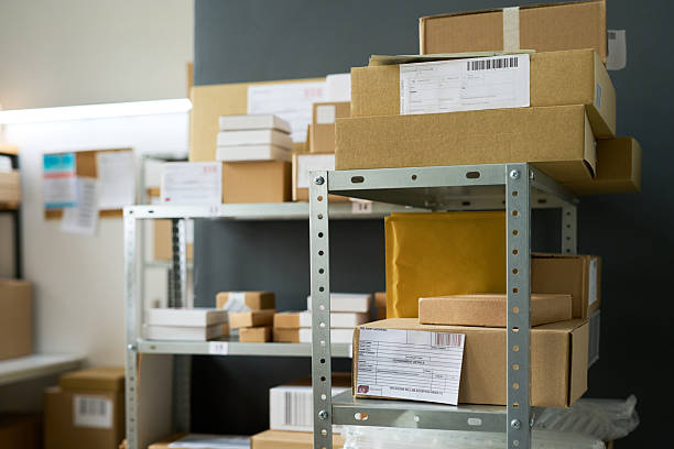 istock Stacked Cardboard Boxes and Parcels Arriving in Modern Warehouse Storage 2236742589