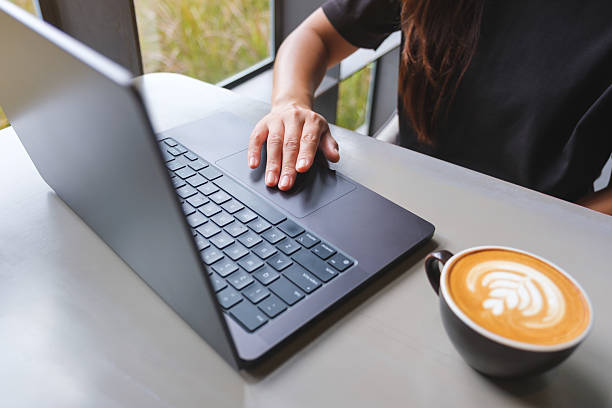 istock Closeup image of a woman working and typing on laptop computer keyboard 2236743974