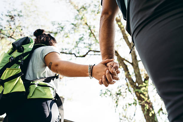istock couple hiking in the mountain 2236749560