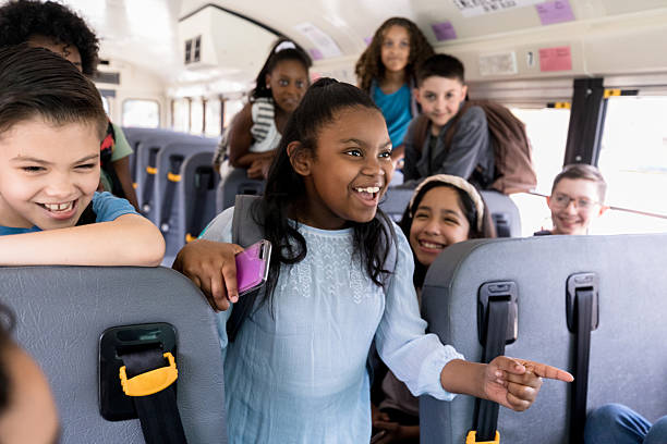 istock Excited Elementary School Children on a School Bus 2236755941