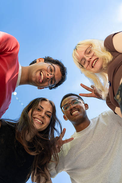 istock Low-angle view of multiethnic teenagers 2236756082