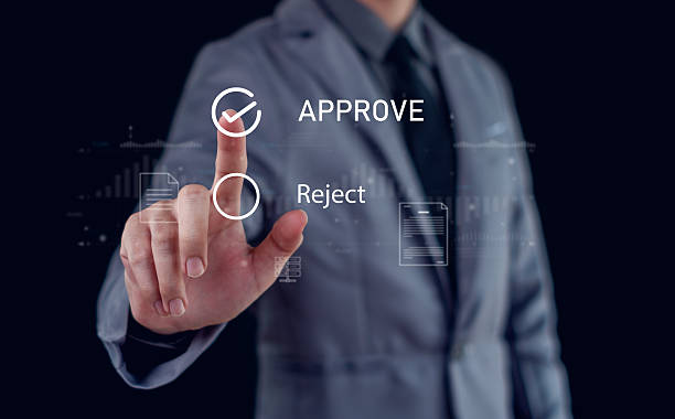 istock Approved, accept, pass inspection, Businessman writing or tick correct mark to approve document and project concept. 2236759126