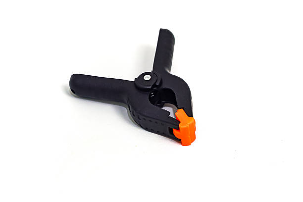 istock Close-up Studio Shot of a Black Plastic Spring Clamp Isolated on White Background 2236760325