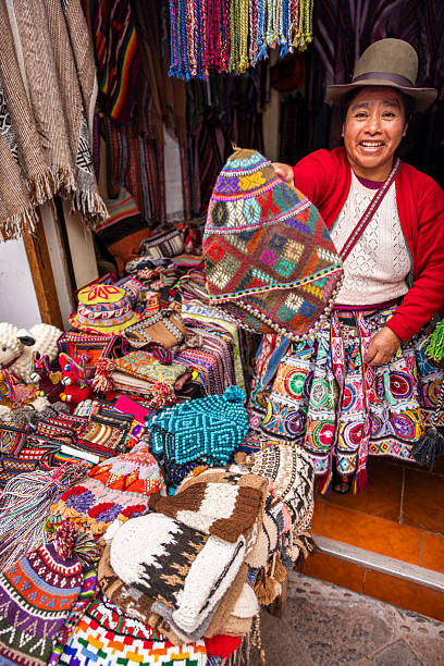 istock Peruvian woman spinning a wool in Pisac, Urubamba Valley 2236761834