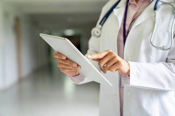 istock Close-up on a doctor using a digital tablet at the hospital 2236762532