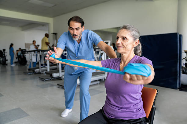 istock Senior woman doing physical therapy using a rubber band 2236762607