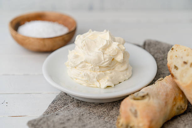 Whipped butter with an olive stick