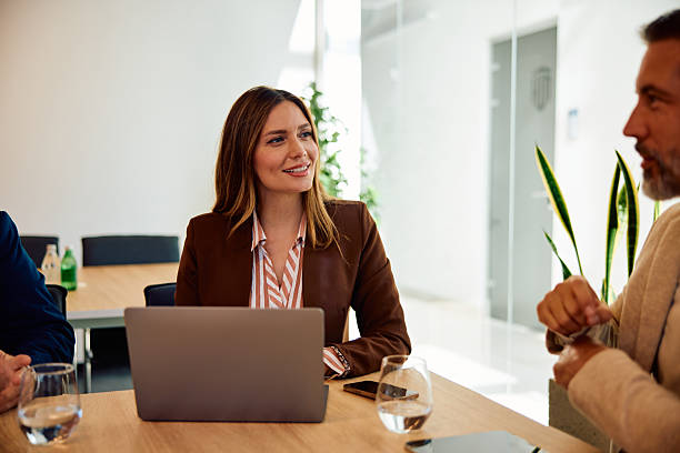istock Successful young professionals having business meeting in modern office 2236766236
