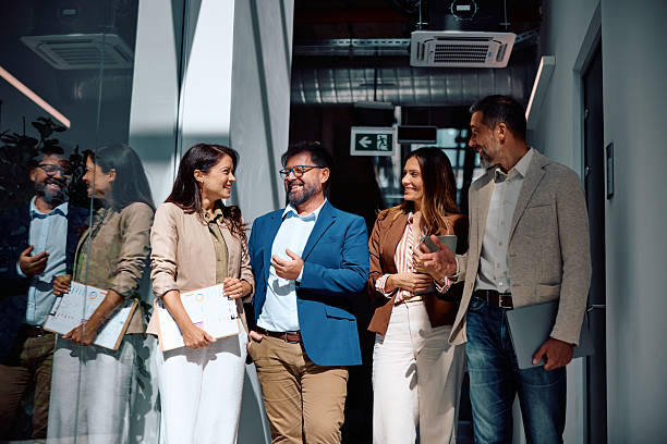 istock Successful multiethnic business team walking together 2236767088
