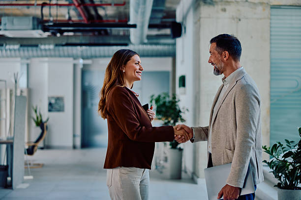 istock Successful business agreement with handshake in modern office 2236767352