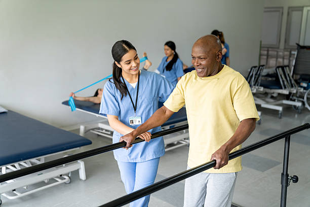 istock Senior man doing physical therapy and walking on bars 2236773528