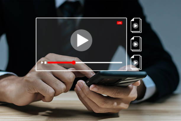 istock business man watching video content online streaming on mobile smartphone, virtual meeting, online business advertising, video marketing, tv show, online study, digital marketing technology concept 2236774744