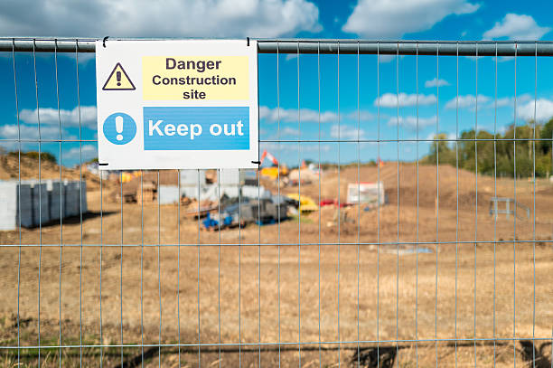 istock Shallow focus of a newly erected Keep Out sign attached to a new housing development project in Britain. 2236778286