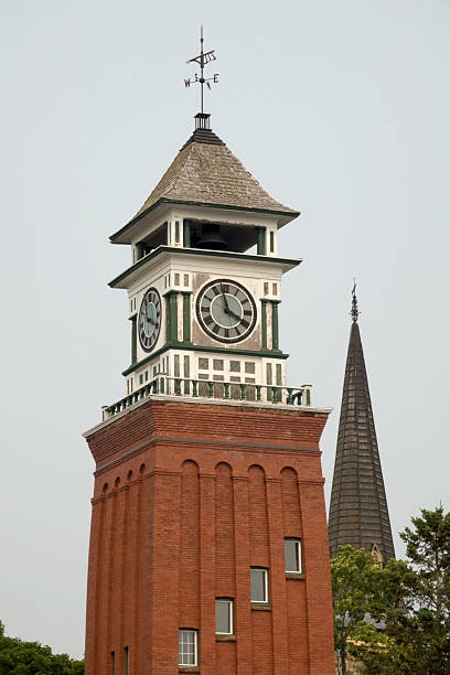 Built in 1903, a brick clock tower, a gift from the Macdonald family, rises near the center of town in Gananoque, Ontario Canada.